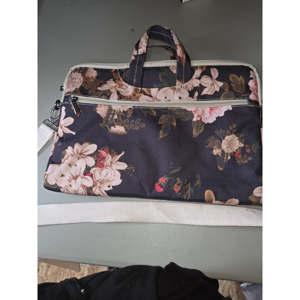 dachee laptop bag. Measures 16"by 11". Outside Pocket Holds Your Supplies . - Picture 2 of 3